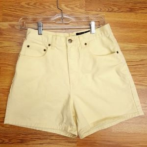 Vtg '90s high-waisted jean shorts, pale yellow